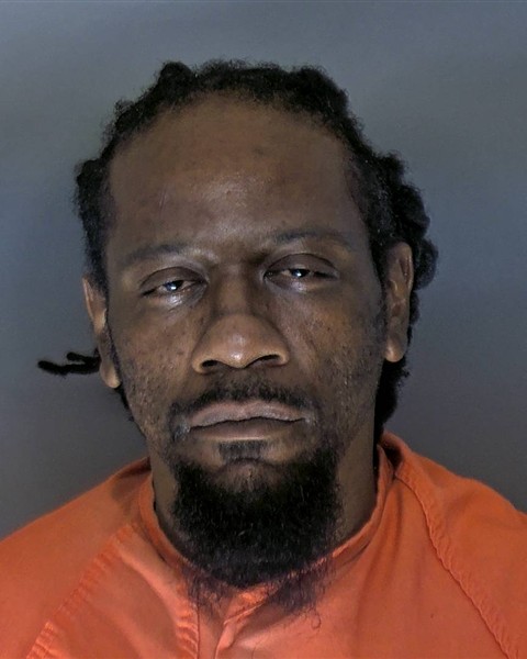 Booking photo of Christopher Mckvian