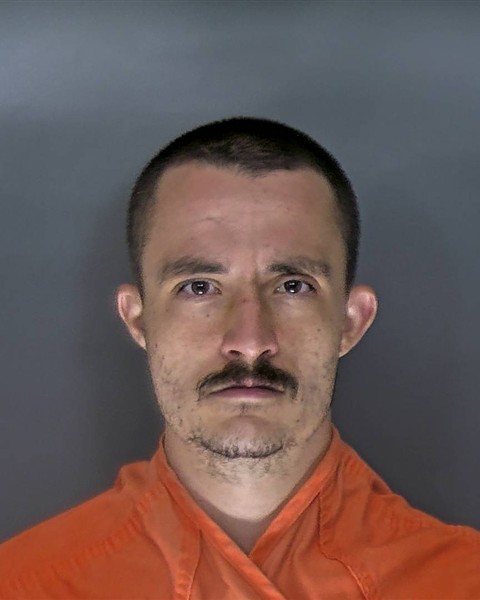 Booking photo of Alex Carson