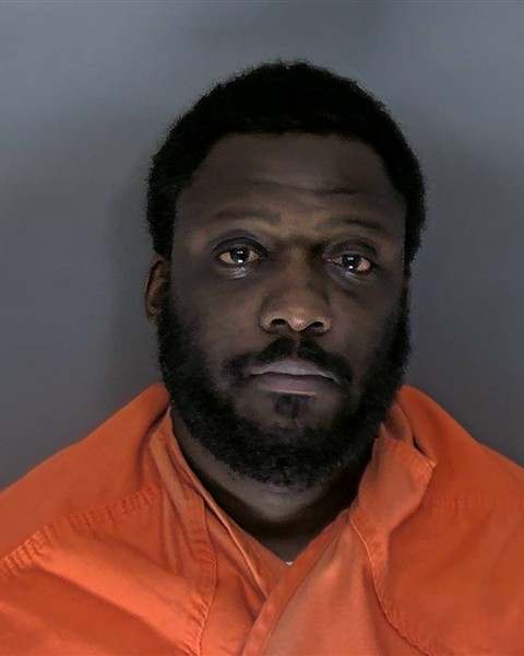 Booking photo of Yomi Sindab