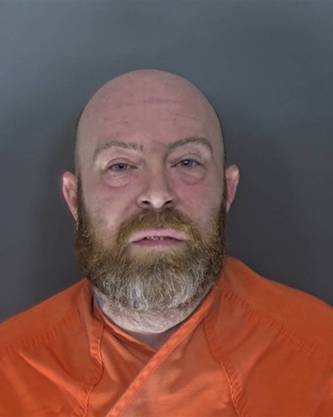 Booking photo of Scott Raymond
