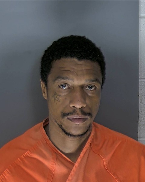 Booking photo of Reggie Miller