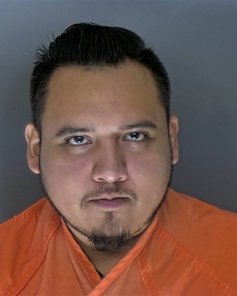 Booking photo of Carlos Martinez Acosta