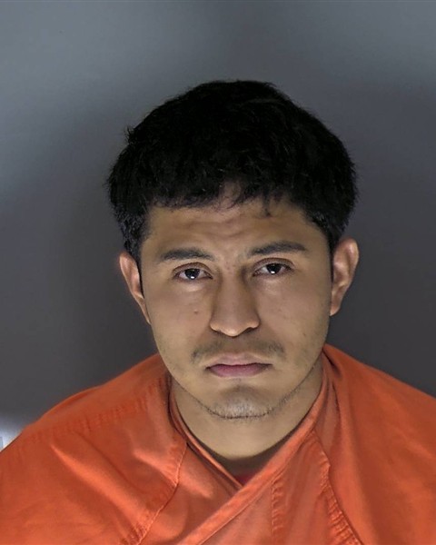 Booking photo of Cristian Flores Morales