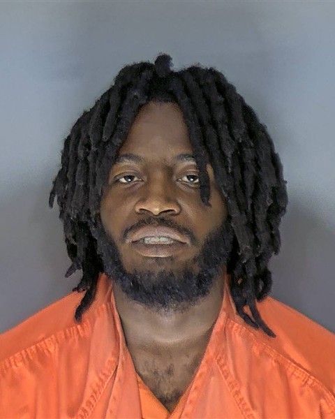 Booking photo of Tre'quan Rhodes
