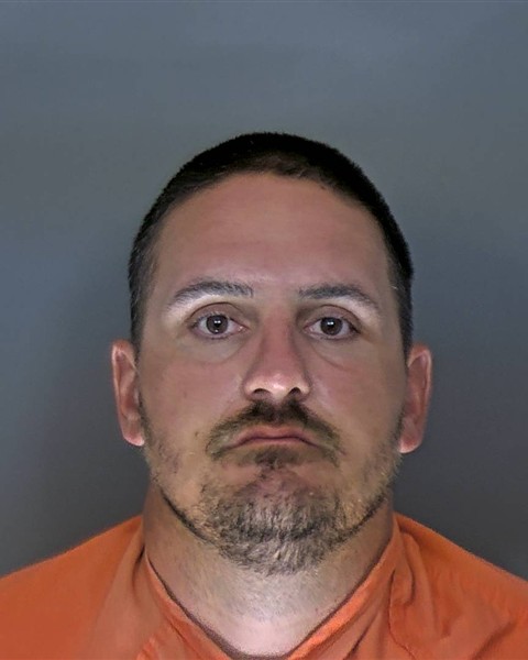 Booking photo of Toby Kenison