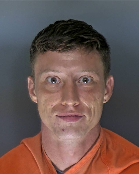 Booking photo of Mitchell Barton