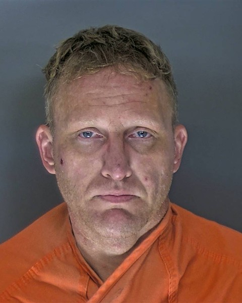 Booking photo of Christopher Thompson