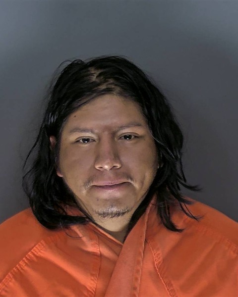Booking photo of Alberto De Roque Calderon