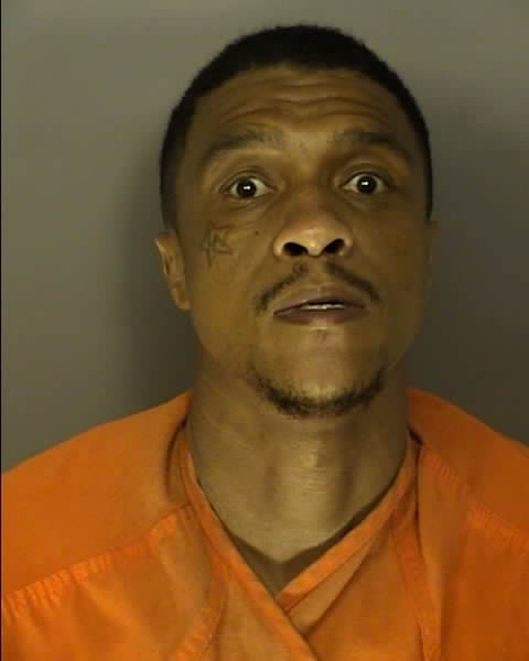 Booking photo of Reggie Miller