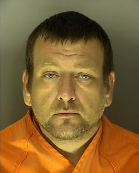 Booking photo of John Hughes