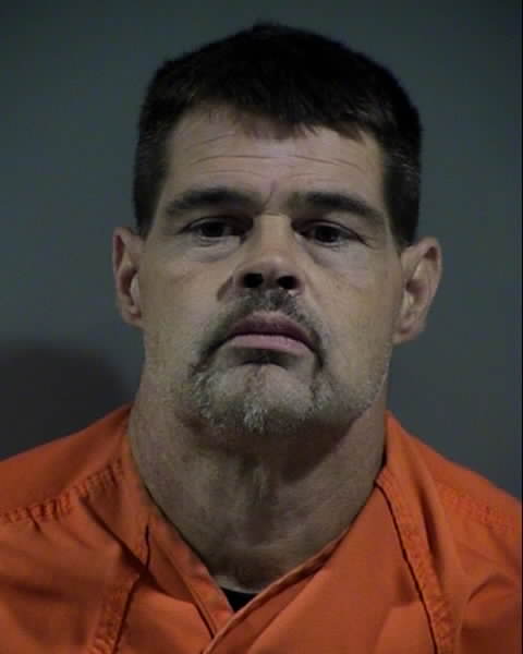 Booking photo of Jason Olson