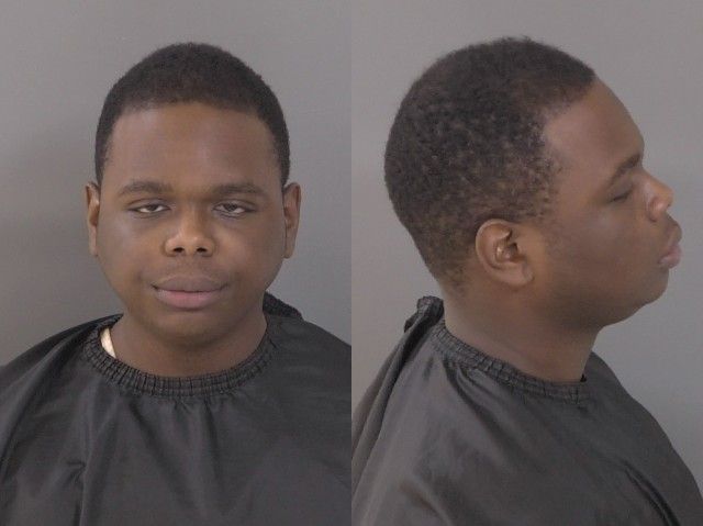 Booking photo of Laurent Auguste