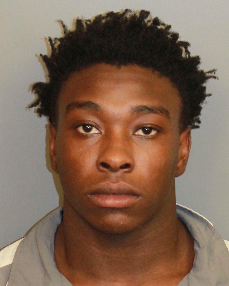 Booking photo of Malachi Character