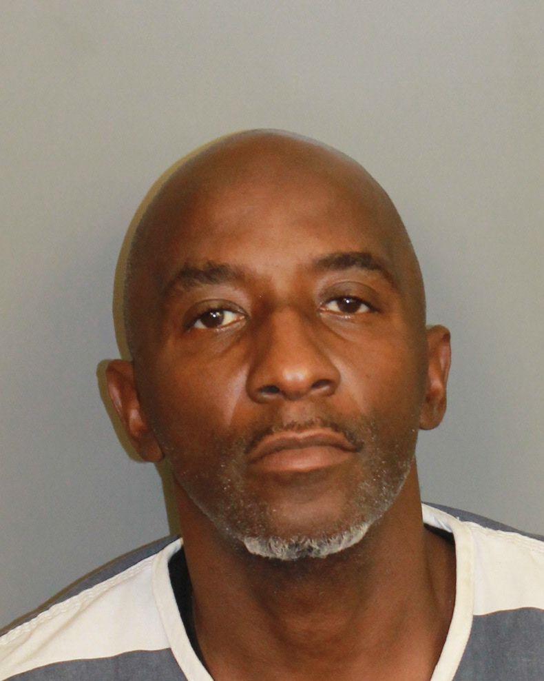 Booking photo of Kwanza Tamper