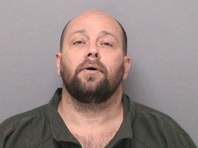 Booking photo of Christopher Burton Mccaslin