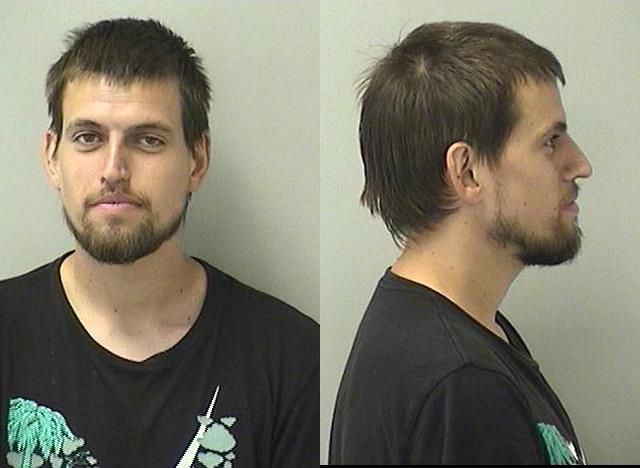 Booking photo of Erik Joseph Lewis