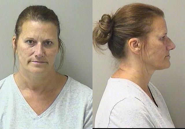 Booking photo of Justine J Dunn