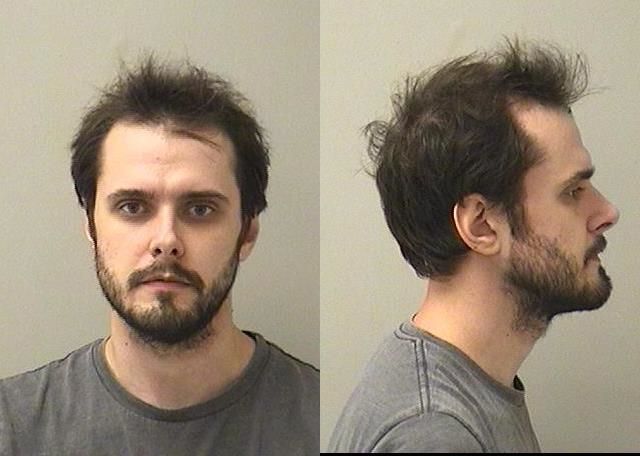 Booking photo of Justin G Gintilas