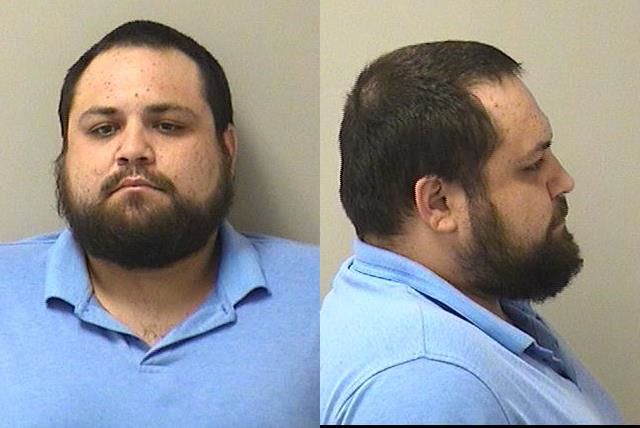 Booking photo of Travis Michael Emery