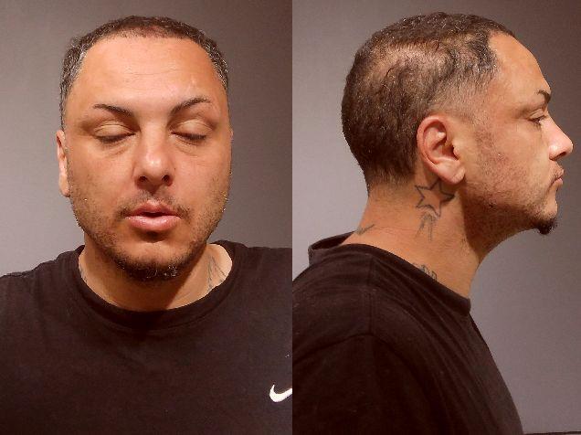 Booking photo of Carlos Ochsenschlager