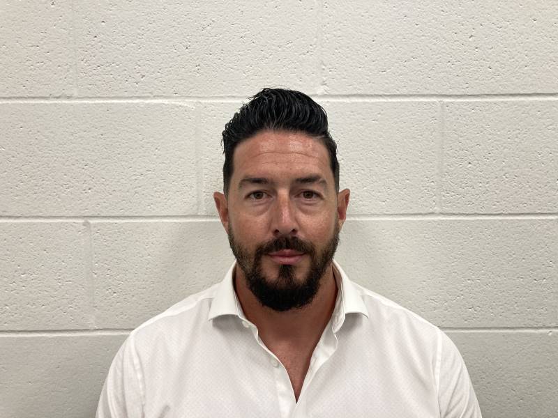 Booking photo of Aaron Thomas