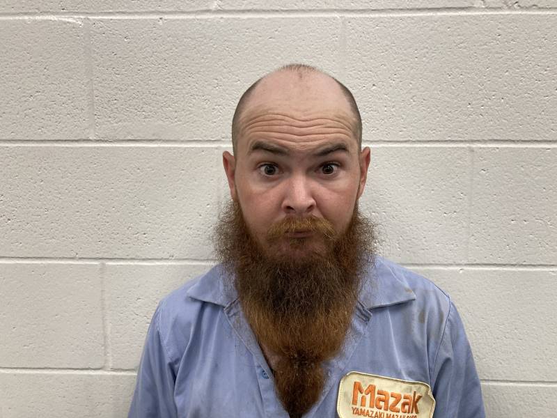 Booking photo of Gregory Dixon