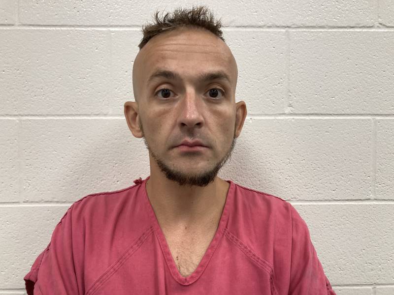 Booking photo of Adam Rose