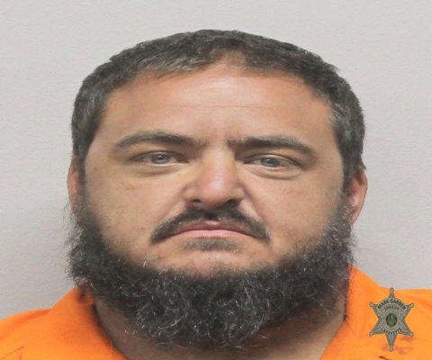 Booking photo of Derek Harrell