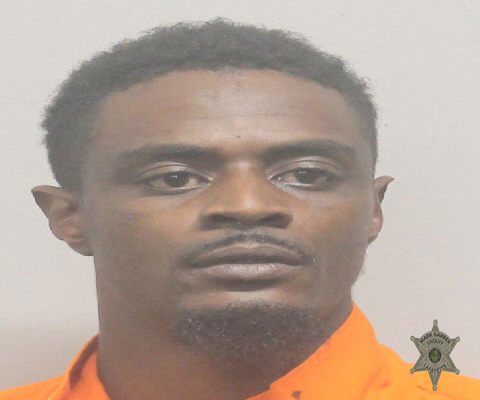Booking photo of Travis Helaire