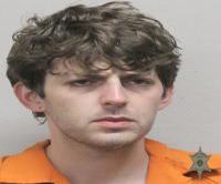 Booking photo of Logan Thornhill