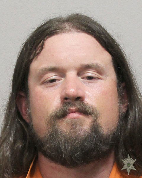 Booking photo of Michael Higdon