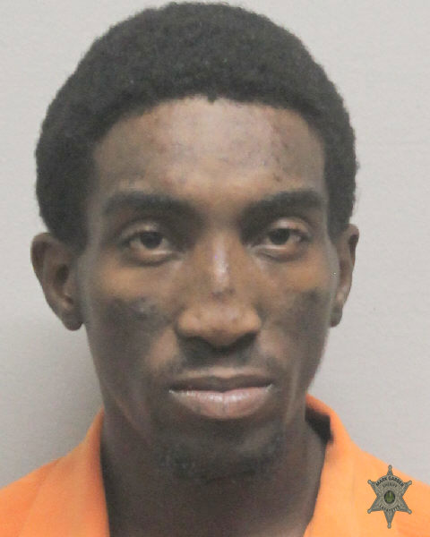 Booking photo of Devin Comeaux