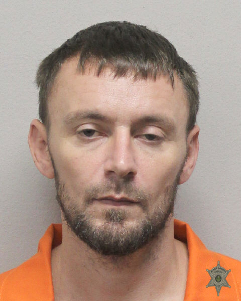 Booking photo of Christopher Broussard