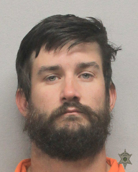 Booking photo of Andrew Roche