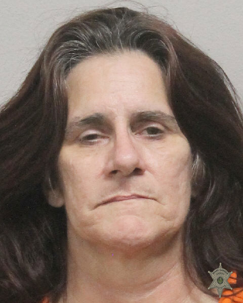 Booking photo of Amy Mills