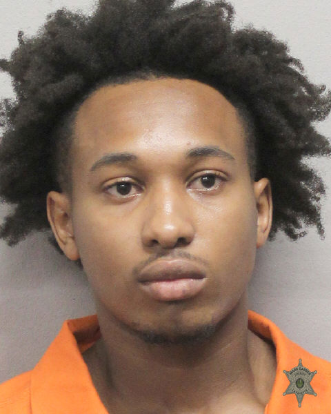 Booking photo of Cameron Moore