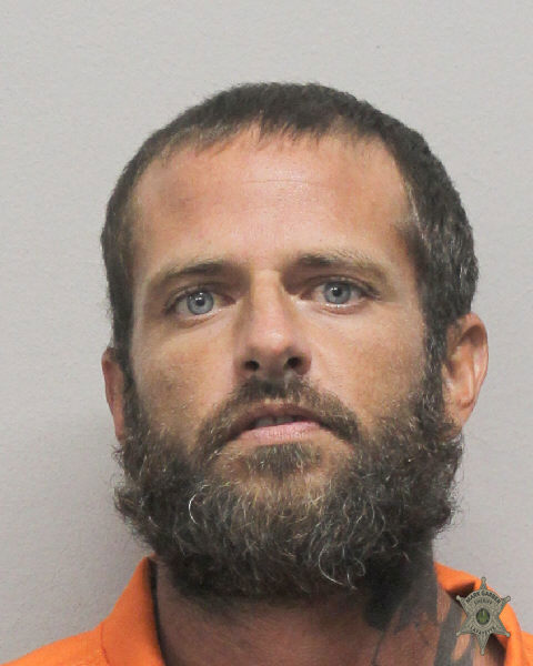Booking photo of Dave Derouen