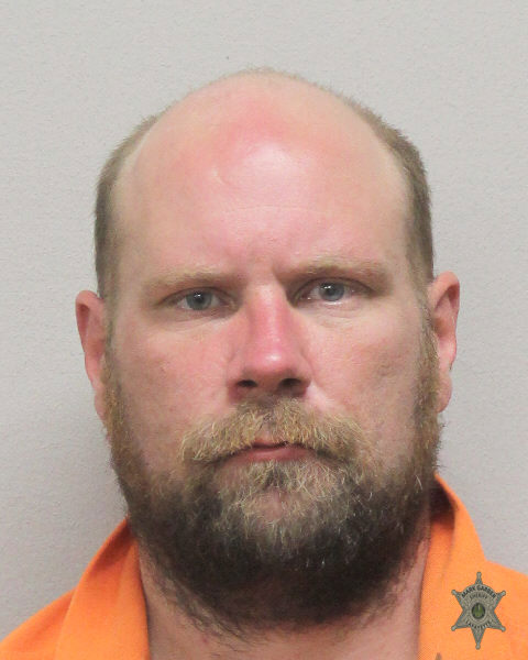 Booking photo of Dustin Gill