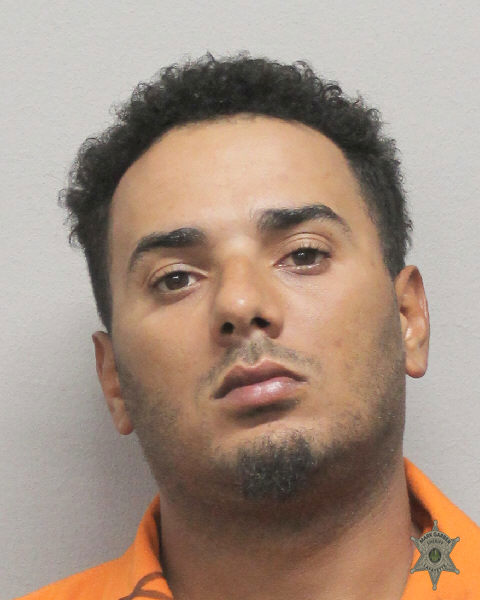 Booking photo of Christopher Broussard