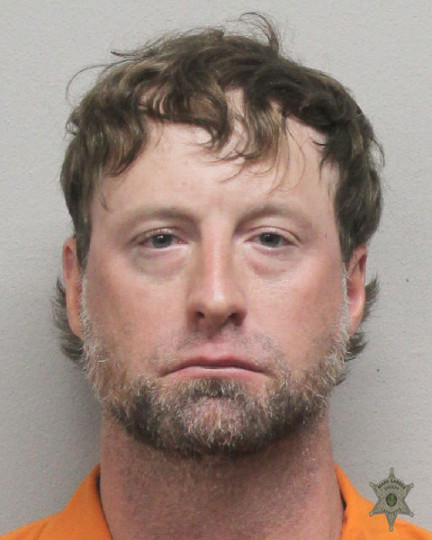 Booking photo of Clayton Talley