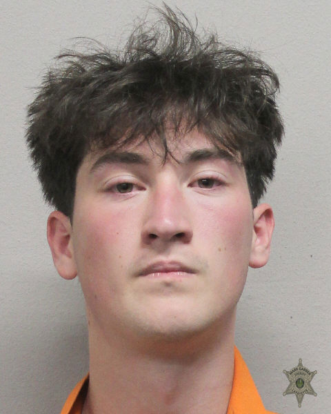 Booking photo of Evan Schneider