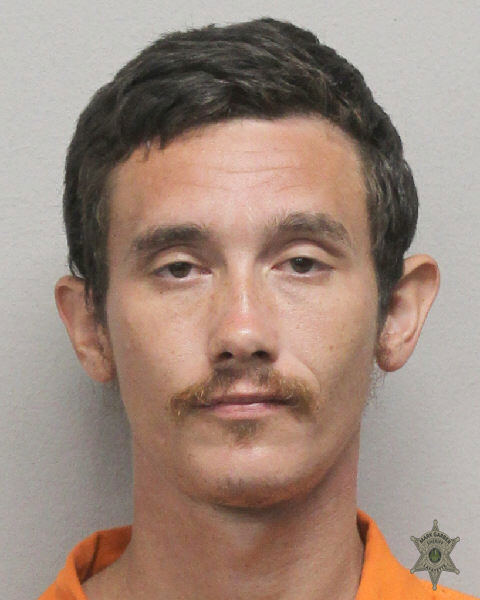 Booking photo of Travis Leucart