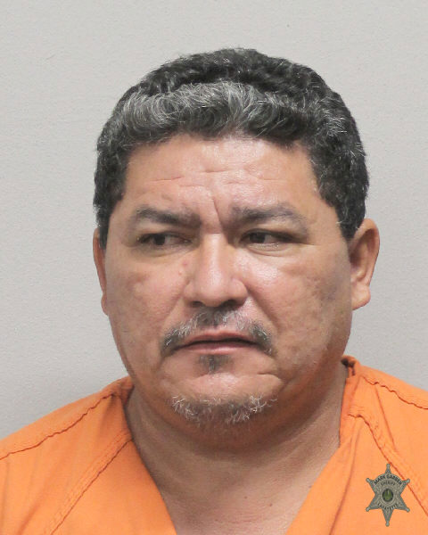 Booking photo of Marco Melgarorellana