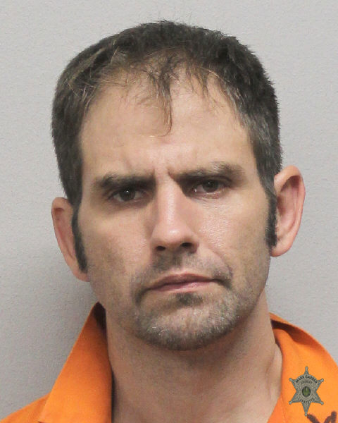Booking photo of Joshua Menard