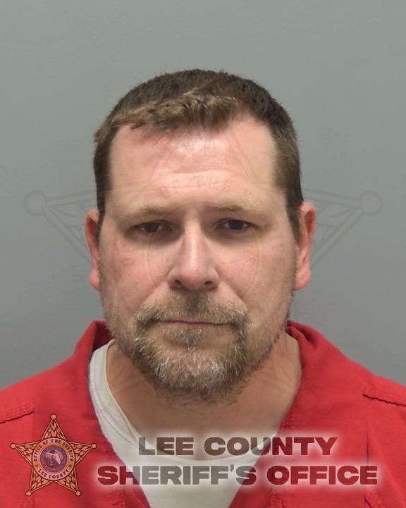 Booking photo of Evan Llewellyn