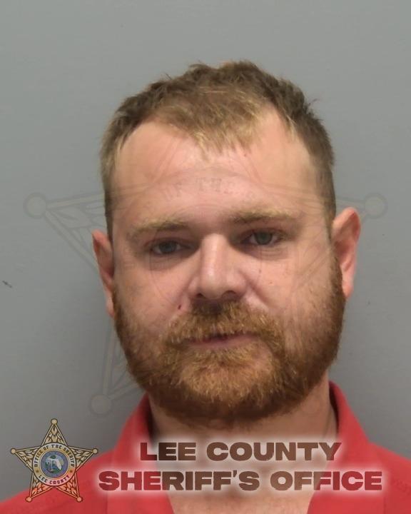 Booking photo of Jonathan Miller