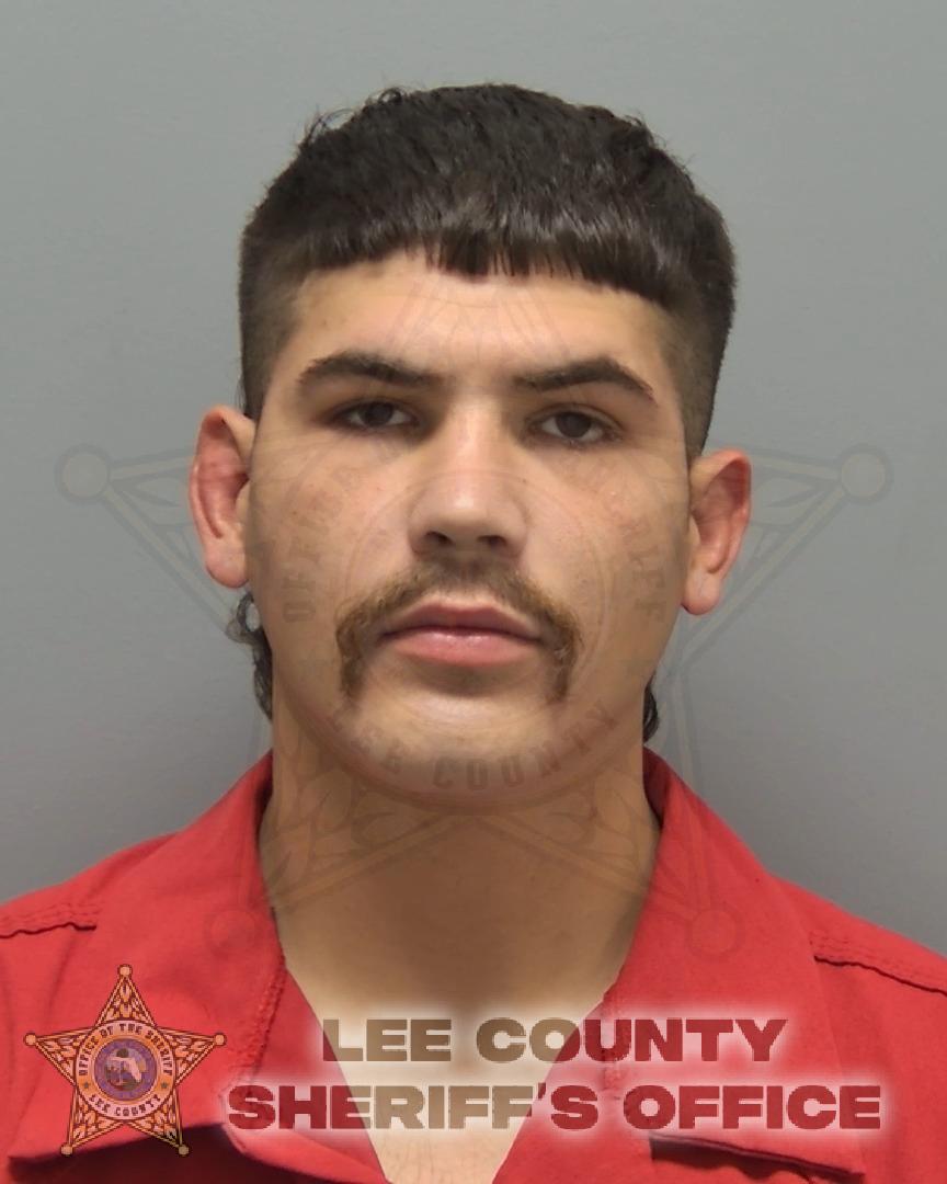 Booking photo of Omar De La Garza