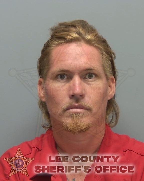 Booking photo of Christopher Adams