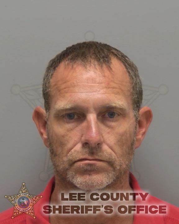 Booking photo of Alex Adkins