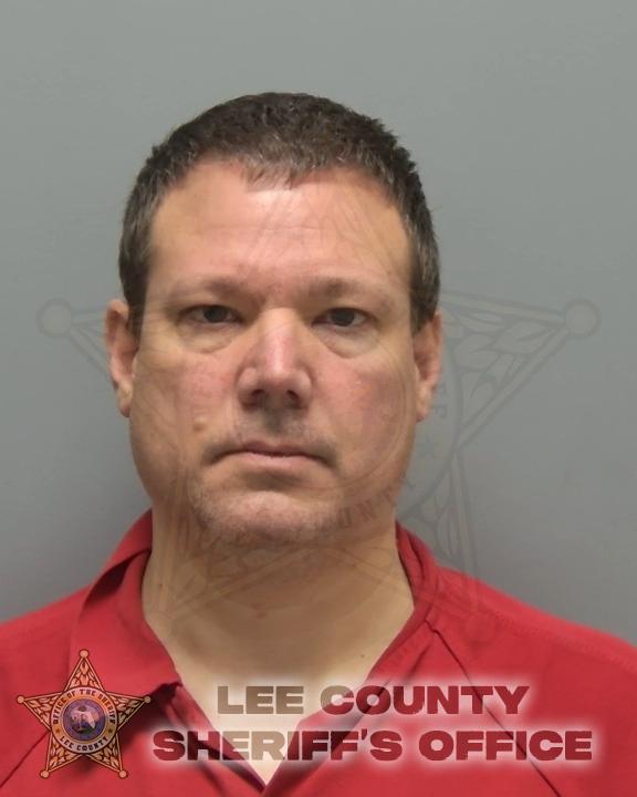 Booking photo of Andrew Feher